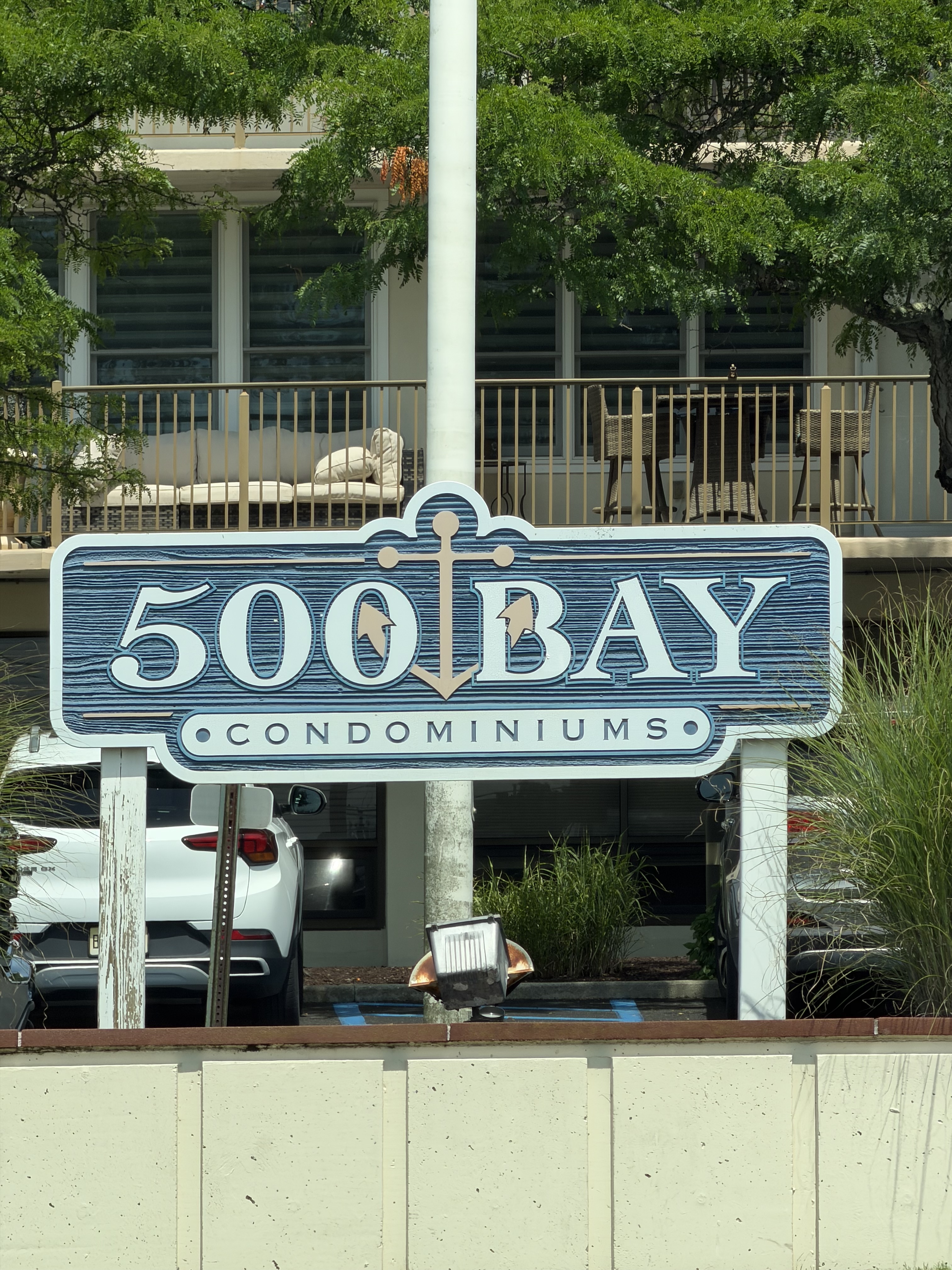 The 500 Bay Condominiums property sign outside the building